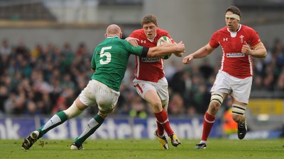 05.02.12 - Ireland v Wales - RBS Six Nations 2012 -.Rhys Priestland of Wales is tackled by Paul O'Connell of Ireland..