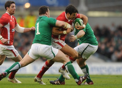 05.02.12 - Ireland v Wales - RBS Six Nations 2012 -.Mike Phillips of Wales is tackled by Cian Healy of Ireland..