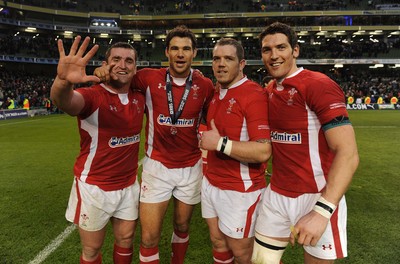 05.02.12 - Ireland v Wales - RBS Six Nations 2012 -.Huw Bennett, Mike Phillips, Paul James and James Hook of Wales celebrate at the end of the game..