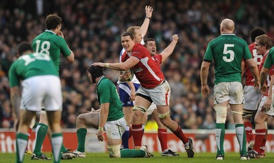 05.02.12 - Ireland v Wales - RBS Six Nations 2012 -.Ian Evans of Wales taps Stephen Ferris of Ireland on the head before he is shown a yellow card for a dangerous tackle..