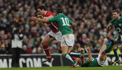 05.02.12 - Ireland v Wales - RBS Six Nations 2012 -.George North of Wales is tackled by Jonathan Sexton of Ireland..