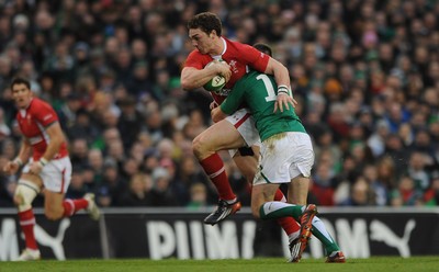 05.02.12 - Ireland v Wales - RBS Six Nations 2012 -.George North of Wales is tackled by Jonathan Sexton of Ireland..