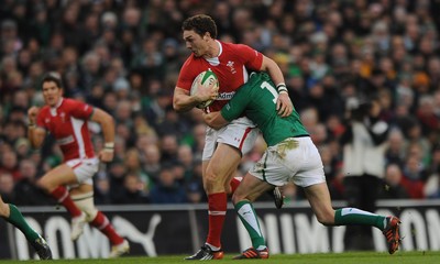 05.02.12 - Ireland v Wales - RBS Six Nations 2012 -.George North of Wales is tackled by Jonathan Sexton of Ireland..