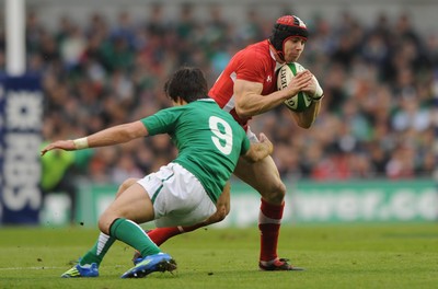 05.02.12 - Ireland v Wales - RBS Six Nations 2012 -.Leigh Halfpenny of Wales takes on Conor Murray of Ireland..