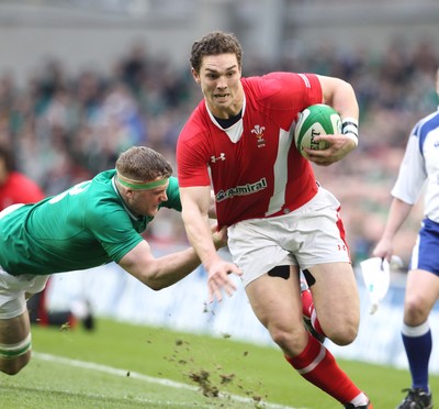 05.02.12  Ireland  v Wales .Wales' George North is tackled by Jamie Heaslip of Ireland..