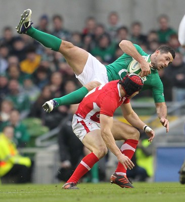 05.02.12  Ireland  v Wales .Wales' Leigh Halfpenny tackles Rob Kearney of Ireland..