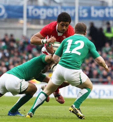 05.02.12  Ireland  v Wales .Toby Faletau of Wales is tackled by Conor Murray and Gordon D'Arcy of Ireland..