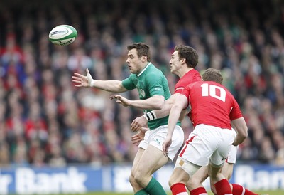 05.02.12 - Ireland v Wales - RBS Six Nations.Ireland's Tommy Bowe is tackled by Wales' George North and Rhys Priestland.