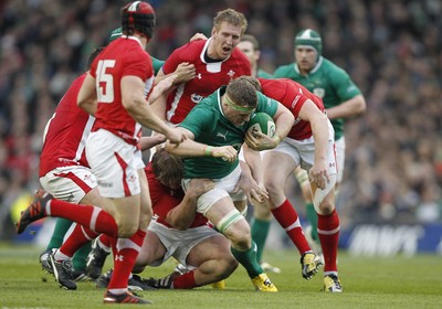 05.02.12 - Ireland v Wales - RBS Six Nations.Ireland's Jamie Healip is tackled by Wales' Rhys Gill.