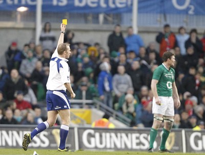 05.02.12 - Ireland v Wales - RBS Six Nations.Wayne Barnes shows Ireland's Stephen Ferris a yellow card.