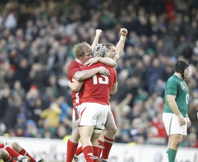 05.02.12 - Ireland v Wales - RBS Six Nations.Wales' Ian Evans, Rhys Gill and Jonathan Davies celebrate the win.