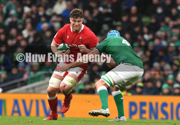 050222 - Ireland v Wales - Guinness Six Nations - Will Rowlands of Wales takes on Tadhg Beirne of Ireland