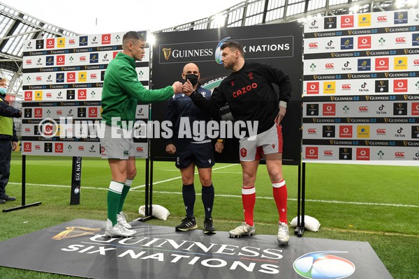 050222 - Ireland v Wales - Guinness Six Nations - Johnny Sexton of Ireland, Referee Jaco Peyper and Dan Biggar of Wales during the coin toss