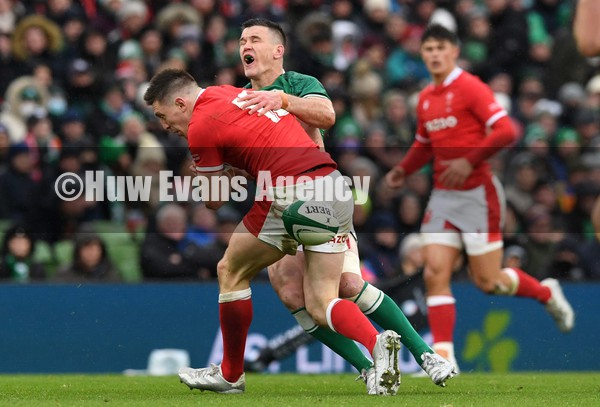 050222 - Ireland v Wales - Guinness Six Nations - Josh Adams of Wales collides with Johnny Sexton of Ireland resulting in a yellow card for Josh Adams