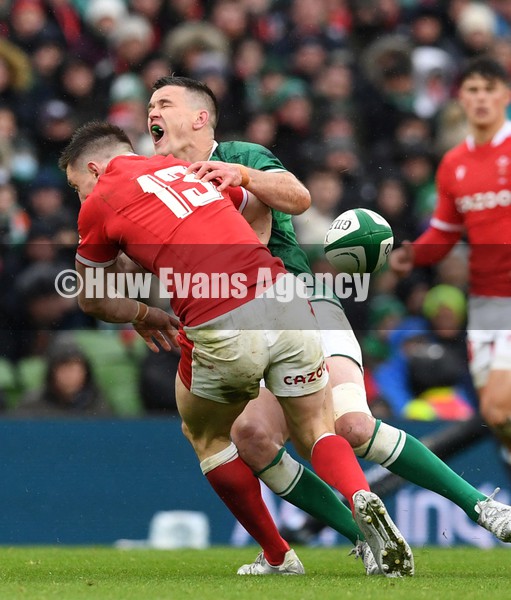 050222 - Ireland v Wales - Guinness Six Nations - Josh Adams of Wales collides with Johnny Sexton of Ireland resulting in a yellow card for Josh Adams
