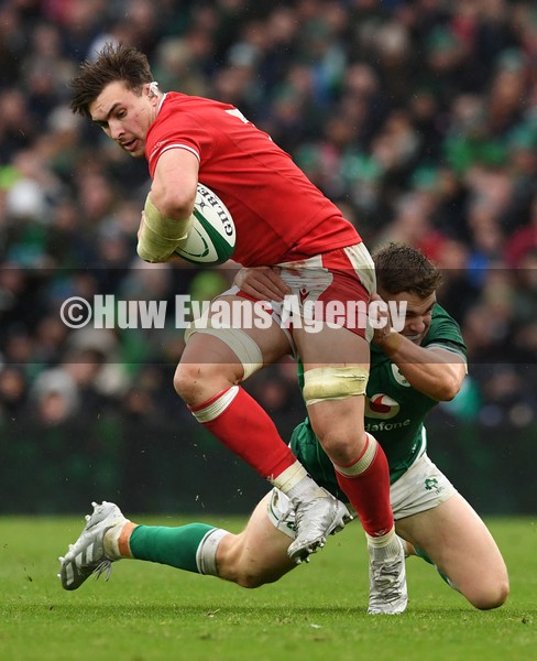 050222 - Ireland v Wales - Guinness Six Nations - Taine Basham of Wales is tackled by Garry Ringrose of Ireland