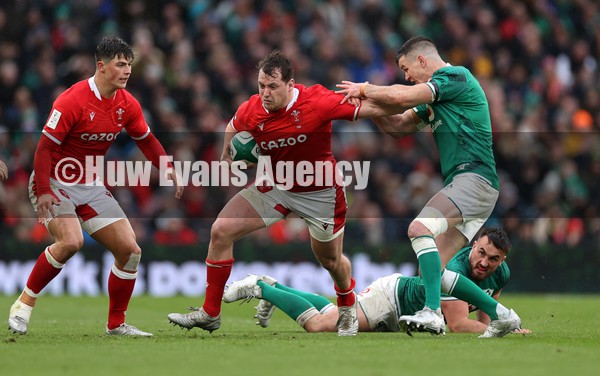 050222 - Ireland v Wales - Guinness Six Nations Championship - Ryan Elias of Wales is tackled by Johnny Sexton of Ireland