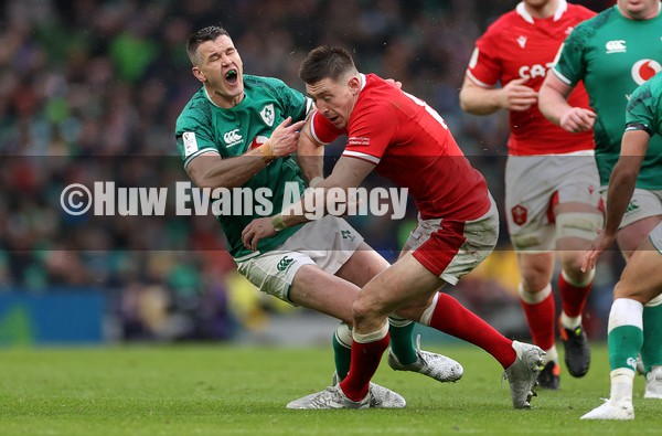 050222 - Ireland v Wales - Guinness Six Nations Championship - Josh Adams of Wales collides with Johnny Sexton of Ireland resulting in a yellow card