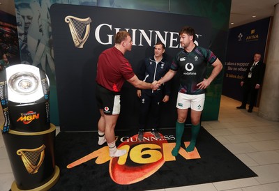 060326 - Ireland v Wales - Guinness Six Nations Championship - Captains Dewi Lake of Wales and Caelan Doris of Ireland during the coin toss