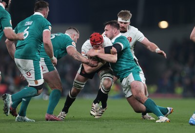 060326 - Ireland v Wales - Guinness Six Nations Championship - James Botham of Wales is tackled by Ronan Kelleher of Ireland 