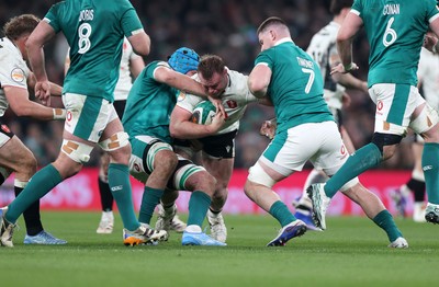 060326 - Ireland v Wales - Guinness Six Nations Championship - Dewi Lake of Wales is tackled by Nick Timoney of Ireland 