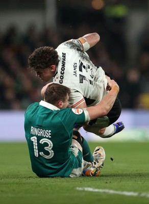060326 - Ireland v Wales - Guinness Six Nations Championship - Eddie James of Wales is tackled by Garry Ringrose of Ireland 