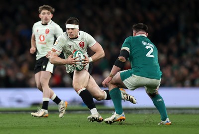 060326 - Ireland v Wales - Guinness Six Nations Championship - Joe Hawkins of Wales is challenged by Ronan Kelleher of Ireland 