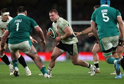 060326 - Ireland v Wales - Guinness Six Nations Championship - Dewi Lake of Wales is challenged by Tom O�Toole of Ireland 