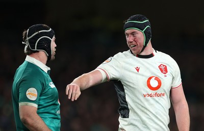 060326 - Ireland v Wales - Guinness Six Nations Championship - Caelan Doris of Ireland and Adam Beard of Wales 