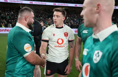 060326 - Ireland v Wales - Guinness Six Nations Championship - Josh Adams of Wales shakes hands with the opposition at full time