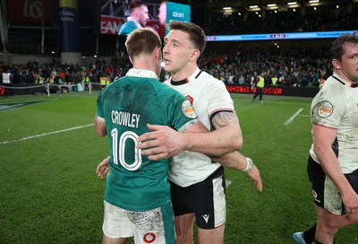 060326 - Ireland v Wales - Guinness Six Nations Championship - Josh Adams of Wales shakes hands with Jack Crowley of Ireland 