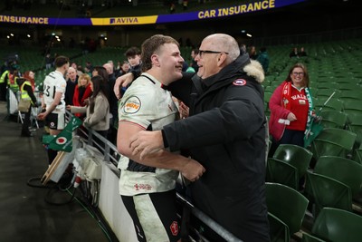 060326 - Ireland v Wales - Guinness Six Nations Championship - Archie Griffin of Wales with family at full time