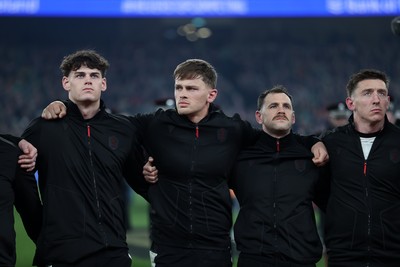 060326 - Ireland v Wales - Guinness Six Nations Championship - Eddie James, Alex Mann and Tomos Williams of Wales 