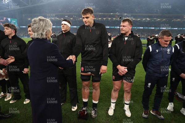 060326 - Ireland v Wales - Guinness Six Nations Championship - Dafydd Jenkins of Wales meets the president of Ireland Catherine Connolly