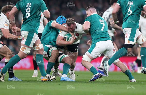 060326 - Ireland v Wales - Guinness Six Nations Championship - Dewi Lake of Wales is tackled by Nick Timoney of Ireland 