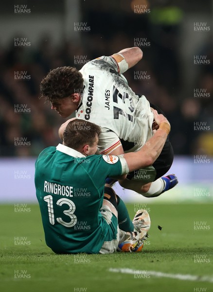 060326 - Ireland v Wales - Guinness Six Nations Championship - Eddie James of Wales is tackled by Garry Ringrose of Ireland 