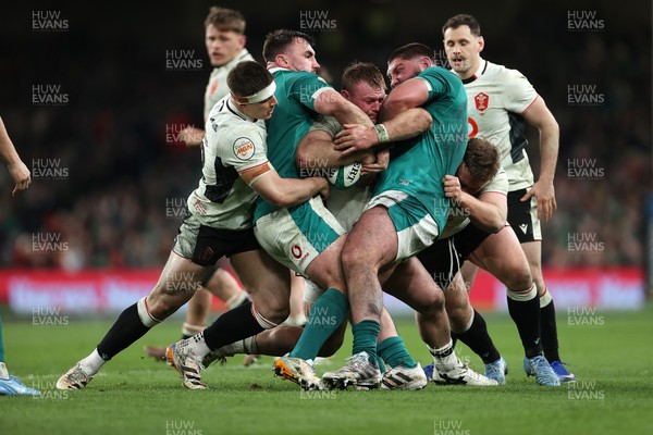 060326 - Ireland v Wales - Guinness Six Nations Championship - Dewi Lake of Wales is tackled by Ronan Kelleher and Tom O�Toole of Ireland 