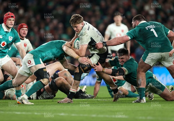060326 - Ireland v Wales - Guinness Six Nations Championship - Alex Mann of Wales is tackled by Ronan Kelleher of Ireland 