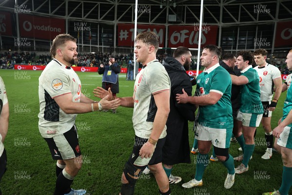 060326 - Ireland v Wales - Guinness Six Nations Championship - Tomas Francis and Alex Mann of Wales at full time