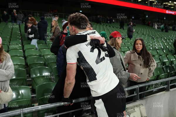 060326 - Ireland v Wales - Guinness Six Nations Championship - Louie Hennessey of Wales with family at full time