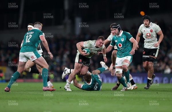 060326 - Ireland v Wales - Guinness Six Nations Championship - Dewi Lake of Wales is tackled by Jack Crowley of Ireland 