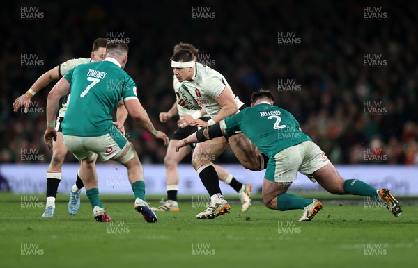060326 - Ireland v Wales - Guinness Six Nations Championship - Joe Hawkins of Wales is tackled by Ronan Kelleher of Ireland 