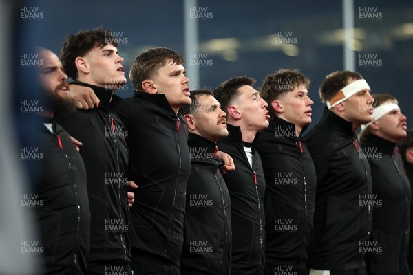060326 - Ireland v Wales - Guinness Six Nations Championship - Tomos Williams of Wales sings the anthem