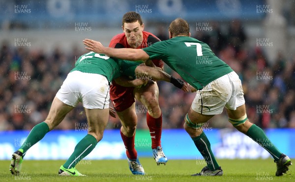 080214 - Ireland v Wales - RBS Six Nations 2014 -George North of Wales is tackled by Fergus McFadden and Chris Henry of Ireland