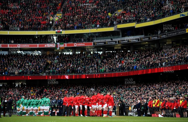 080220 - Ireland v Wales - Guinness Six Nations - Wales and Ireland players line up for the anthems