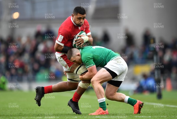 080220 - Ireland v Wales - Guinness Six Nations - Taulupe Faletau of Wales is tackled by Andrew Conway of Ireland