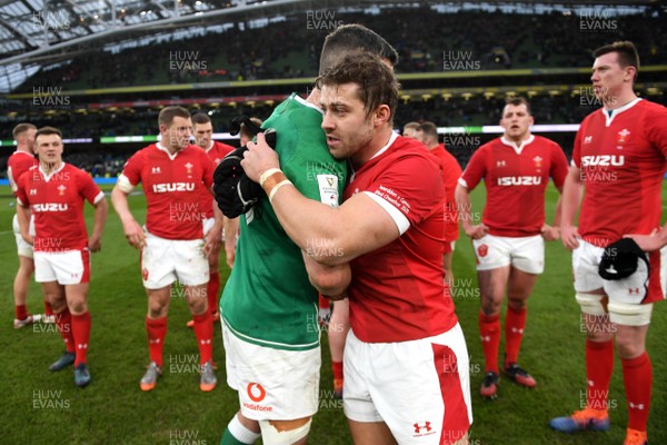 080220 - Ireland v Wales - Guinness Six Nations - Jonathan Sexton of Ireland and Leigh Halfpenny of Wales at the end of the game