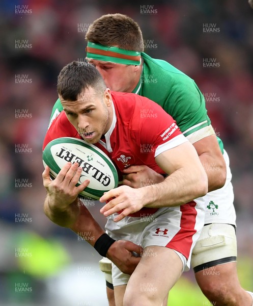 080220 - Ireland v Wales - Guinness Six Nations - Gareth Davies of Wales is tackled by CJ Stander of Ireland