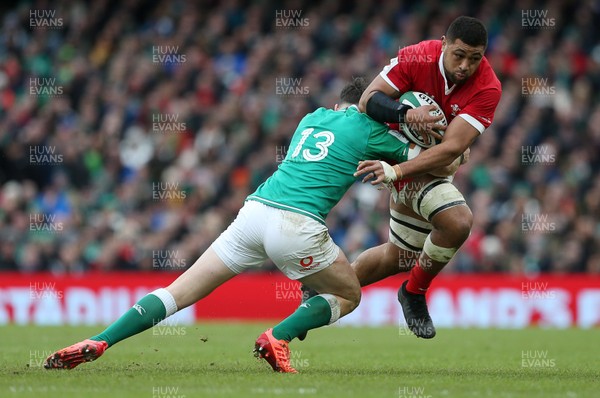 080220 - Ireland v Wales - Guinness 6 Nations - Taulupe Faletau of Wales is tackled by Robbie Henshaw of Ireland
