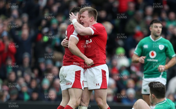080220 - Ireland v Wales - Guinness 6 Nations - Tomos Williams celebrates scoring a try with Nick Tompkins of Wales